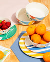 Bamboo Bowl Sets on a table with fruits in it.