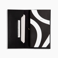 Petite Folio in Black with folio notebook on a white background.