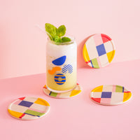Poketo Coasters in Colorblock with drinking glass in Aqua