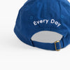 Close up back view of the Art Every Day Cap in Cobalt on a white background.