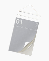 The Grey Spectrum Wall Planner and Acrylic Poster Hanger on a white background. 