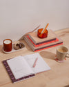 Poketo Noteworthy Bundle on a desk setting 