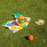 Bamboo Salad Plates in Angles on a grass background