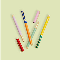 The PK Colorblock Cap Pens displayed on a grey background. 
