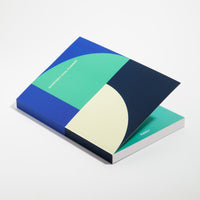 The Quarterly Goal Planner in Blue on a white background. 