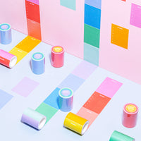 Sticky Rolls in Notes and checkers on a pink background. 