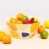 Bamboo serving bowl in Pebbles with filled fruit