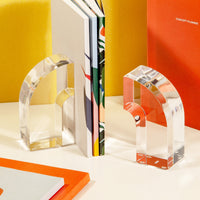 Pair of bookends with various notebooks