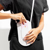 Phone Crossbody in gray on a model
