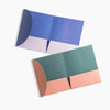 New Poketo Tuck Folders Set of 2 in orange/green and blue/purple geometric print
